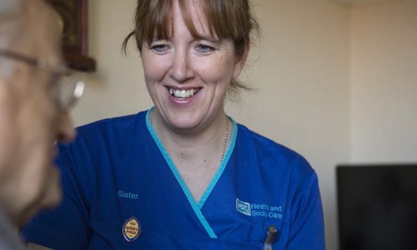 Northern Irish District Nurse With Patient The Queens Nursing Institute 