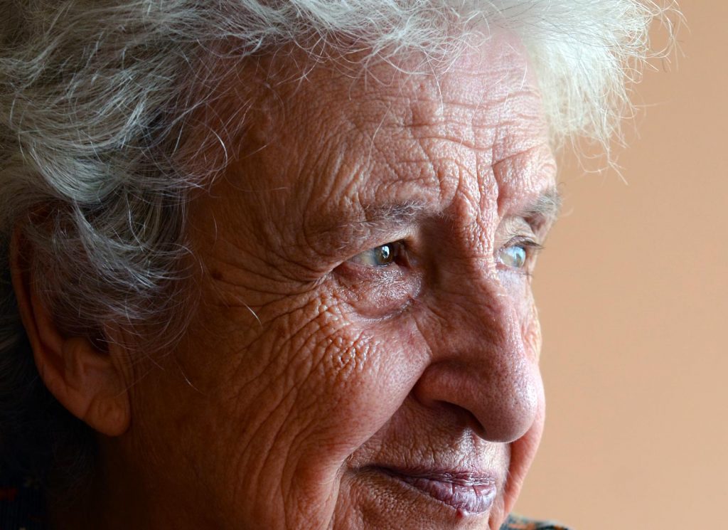 A close up portrait of an elderly woman