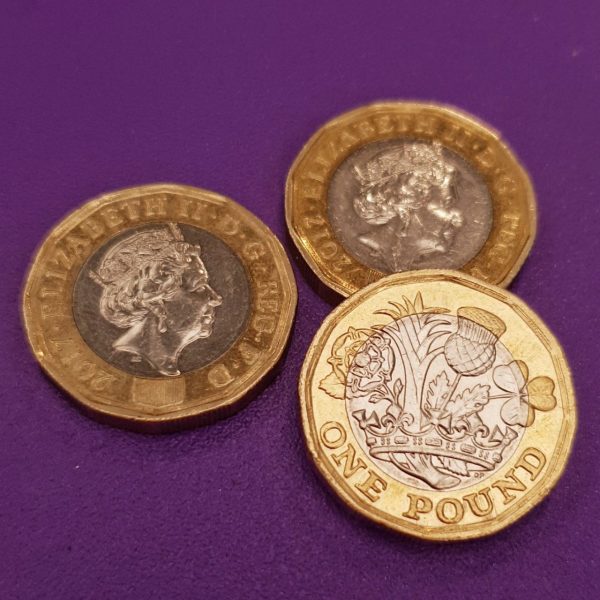 An image of three pound coins