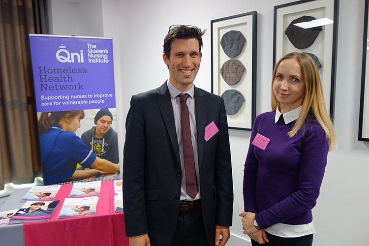 A photograph of QNI staff member at a Homeless Health event