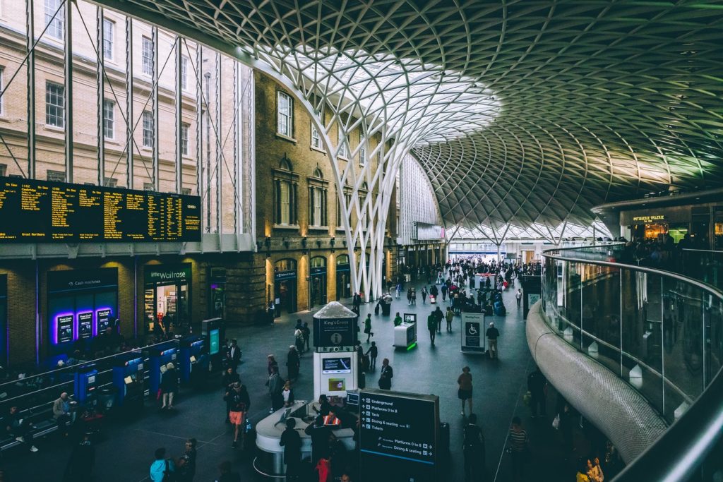 A photograph of a busy train station in London
