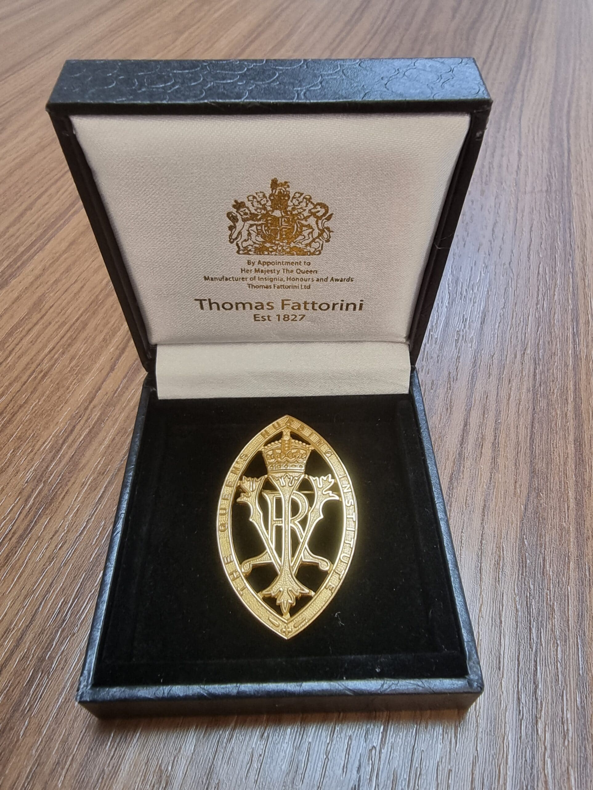 Gold badge 2 – The Queen's Nursing Institute